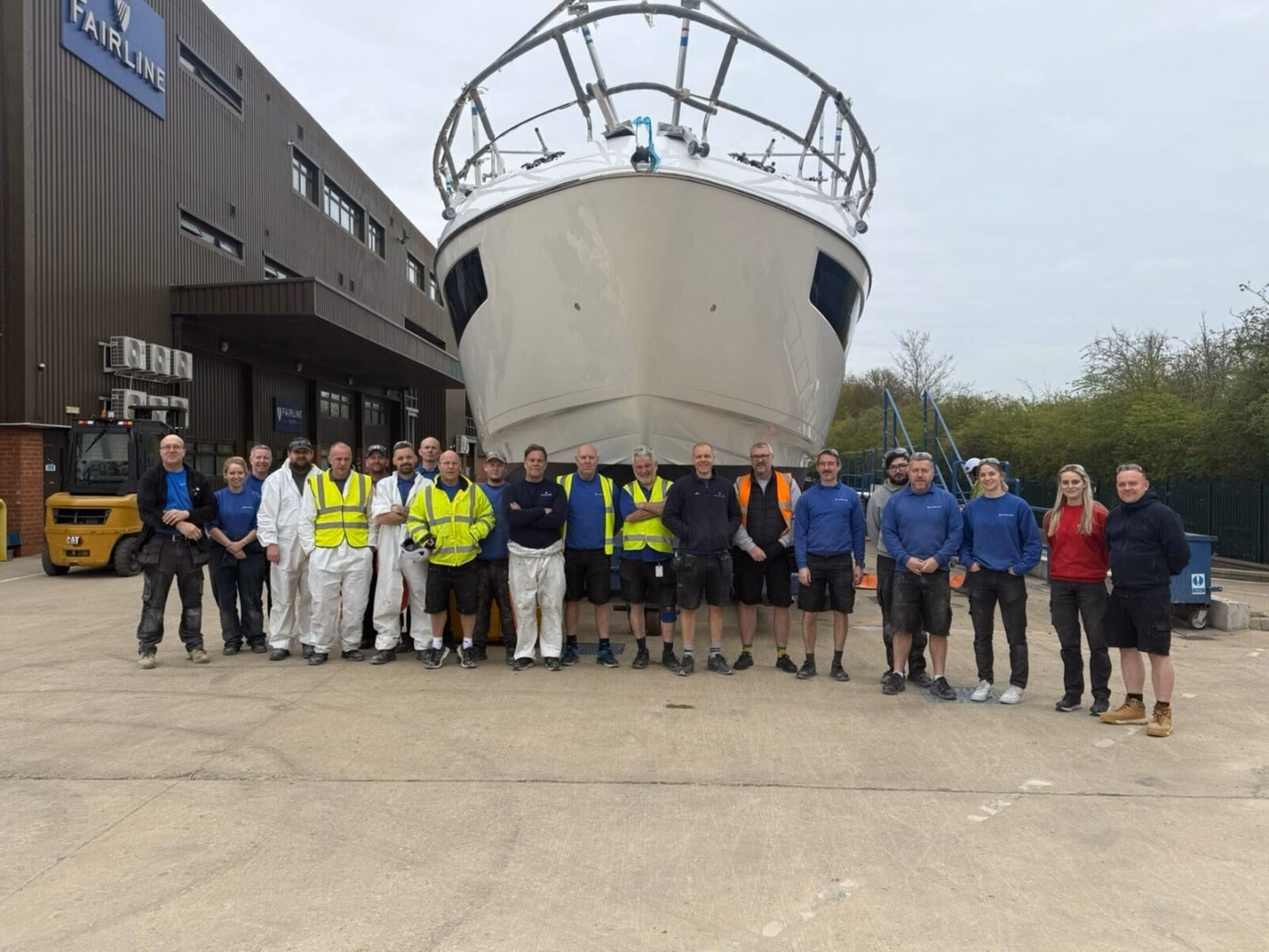 Boatyard team with new vessel