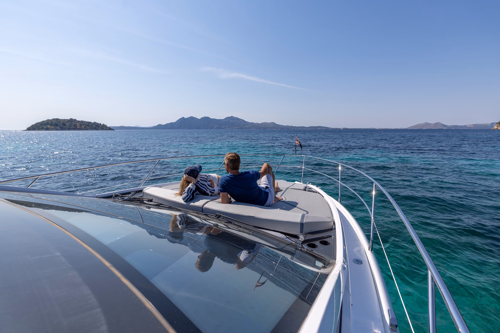 Couple relaxing on yacht deck