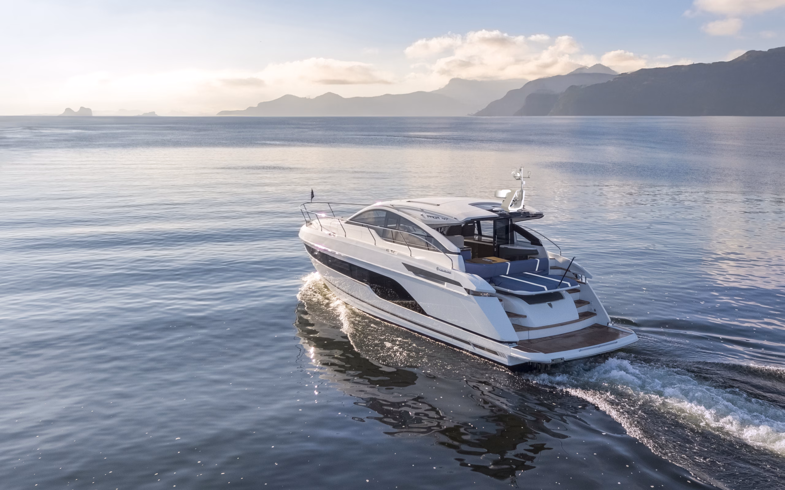 Luxury yacht sails calm sea