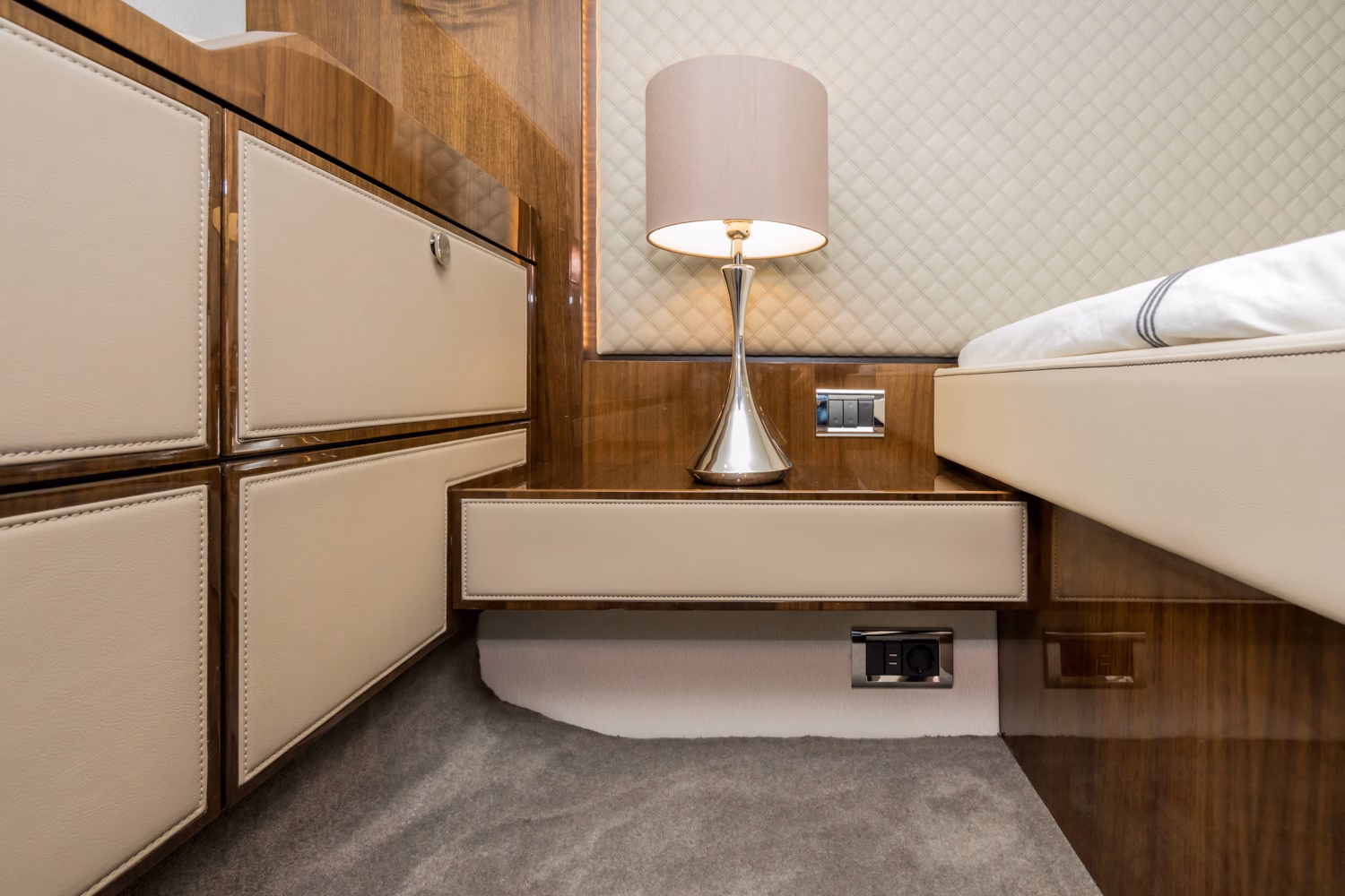 Bedroom bedside with lamp.