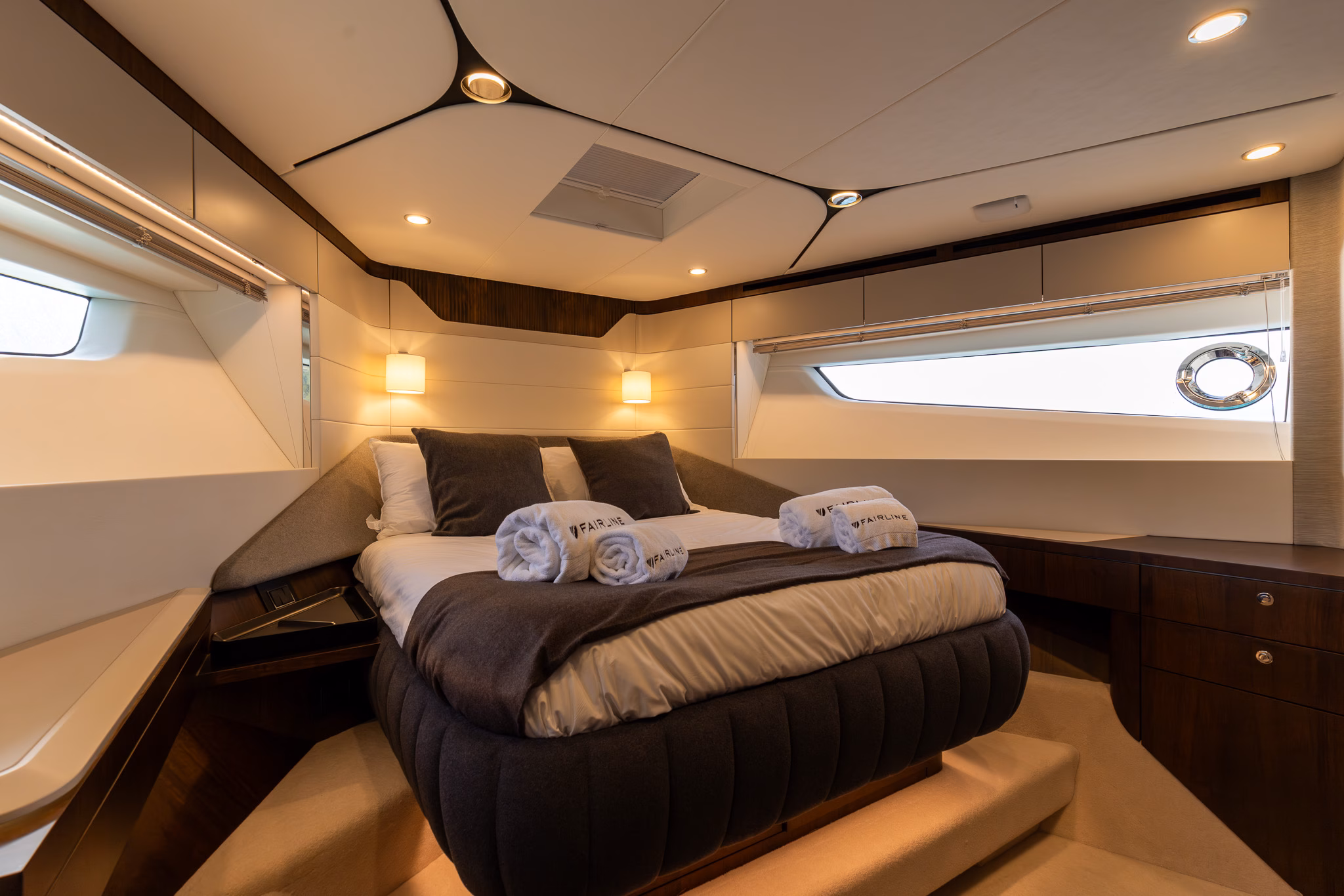 Luxury yacht cabin with bed