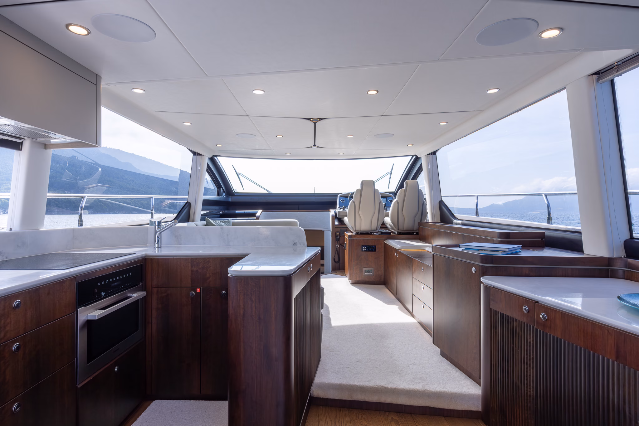 Luxury yacht interior galley and helm