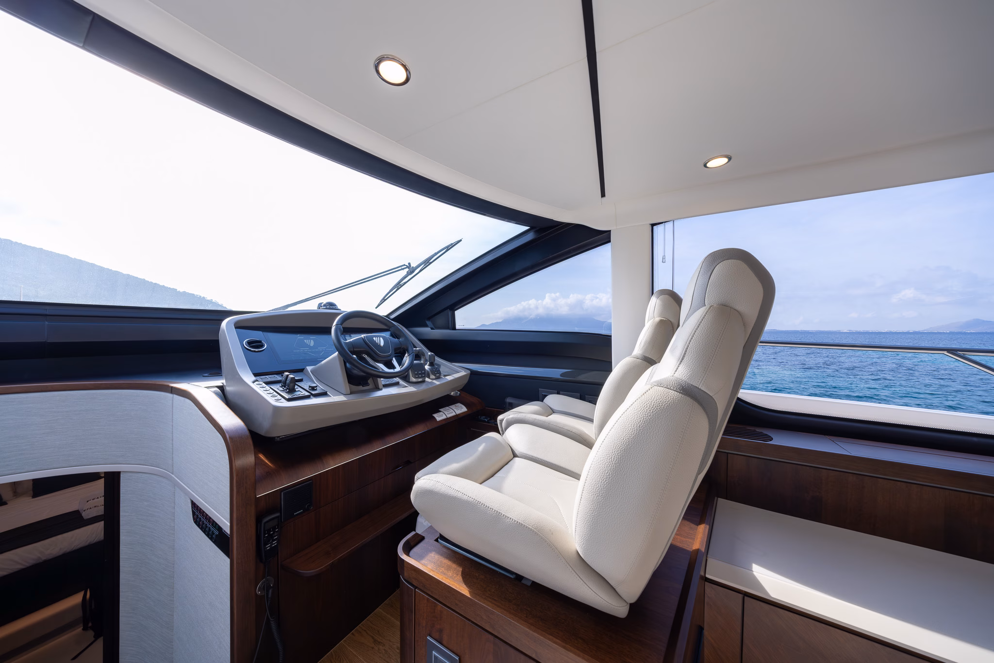 Luxury yacht bridge with captains seats