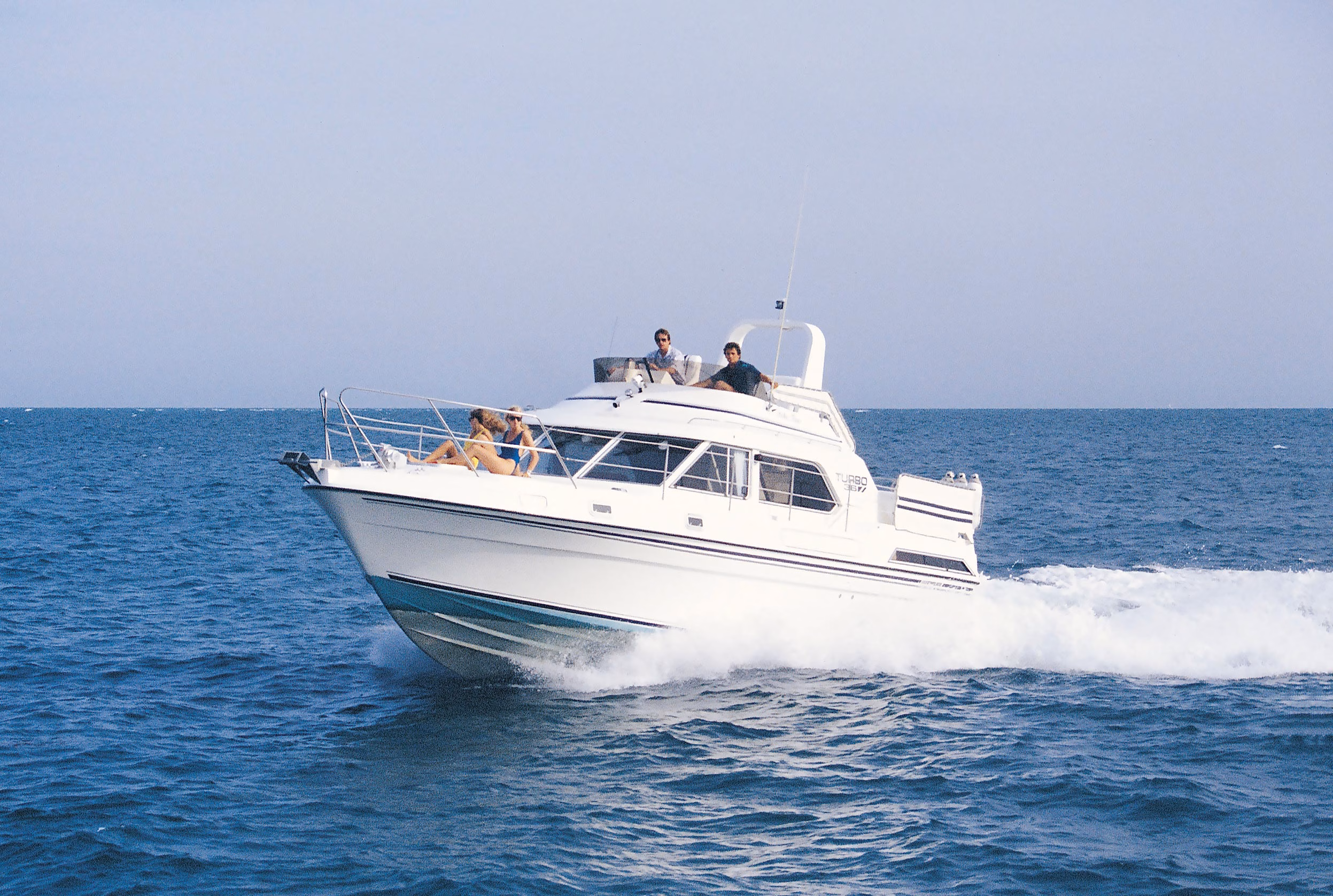 White yacht cruising on the sea