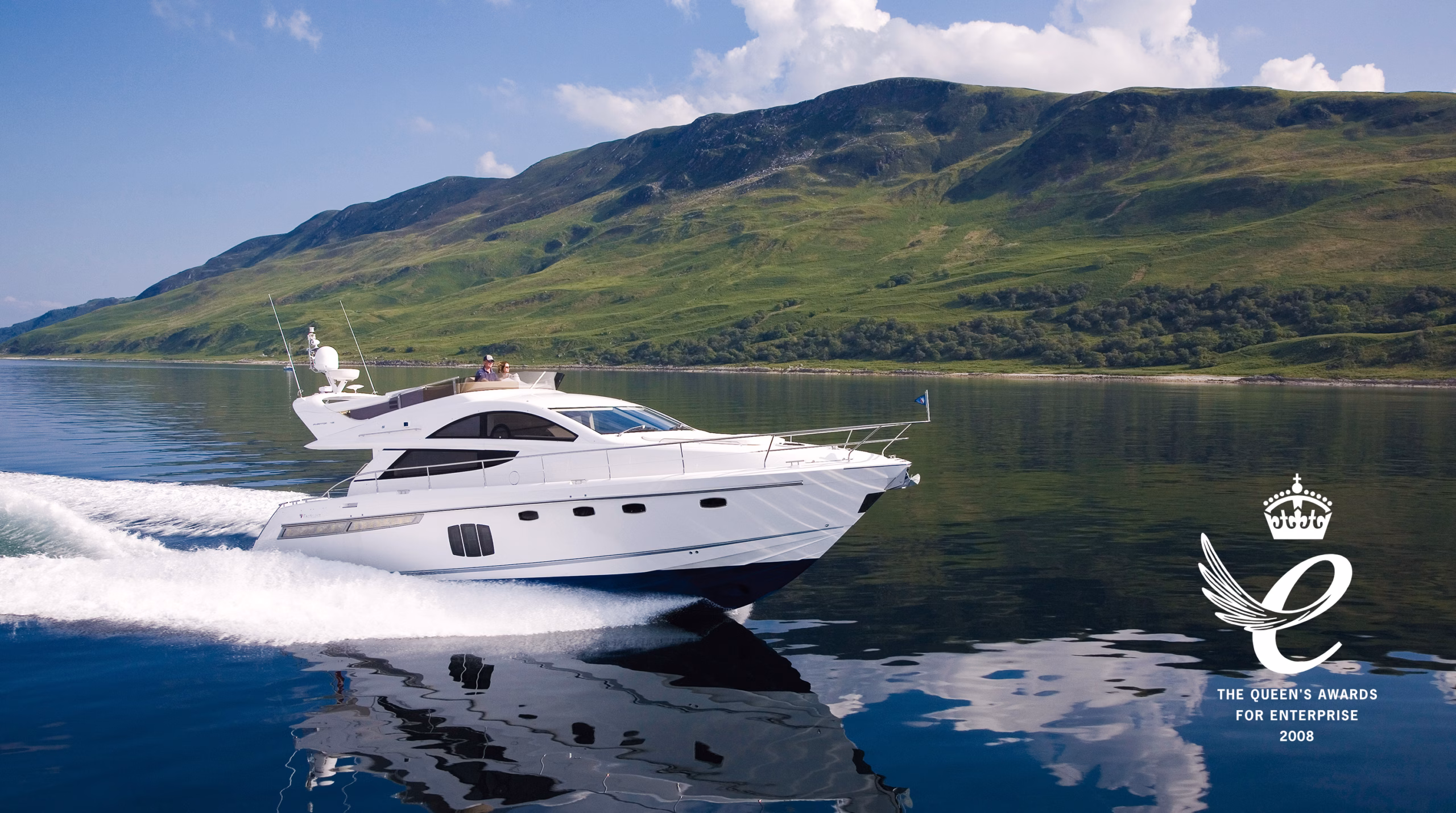 Luxury yacht sailing on water.