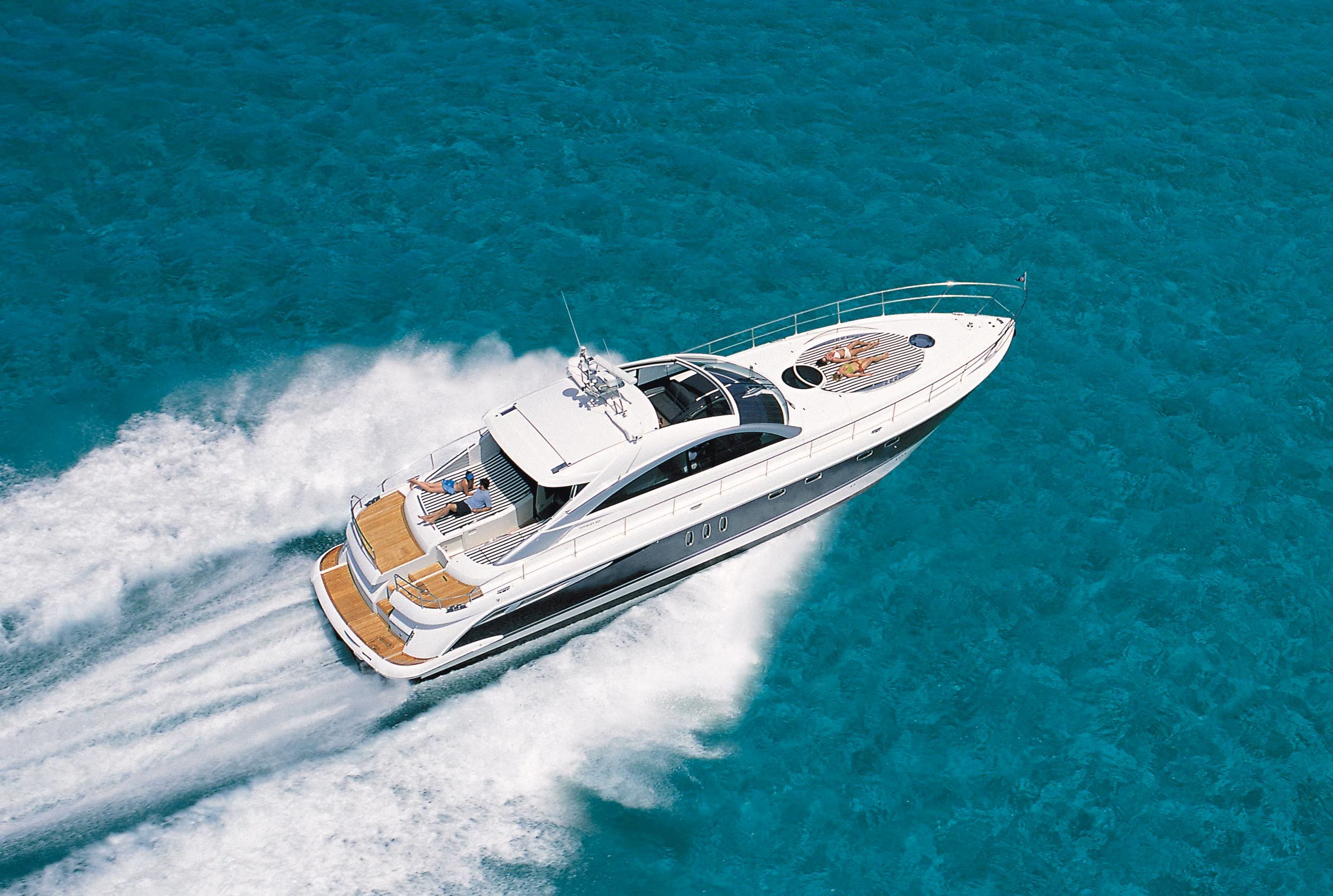 Luxury yacht cruising clear waters