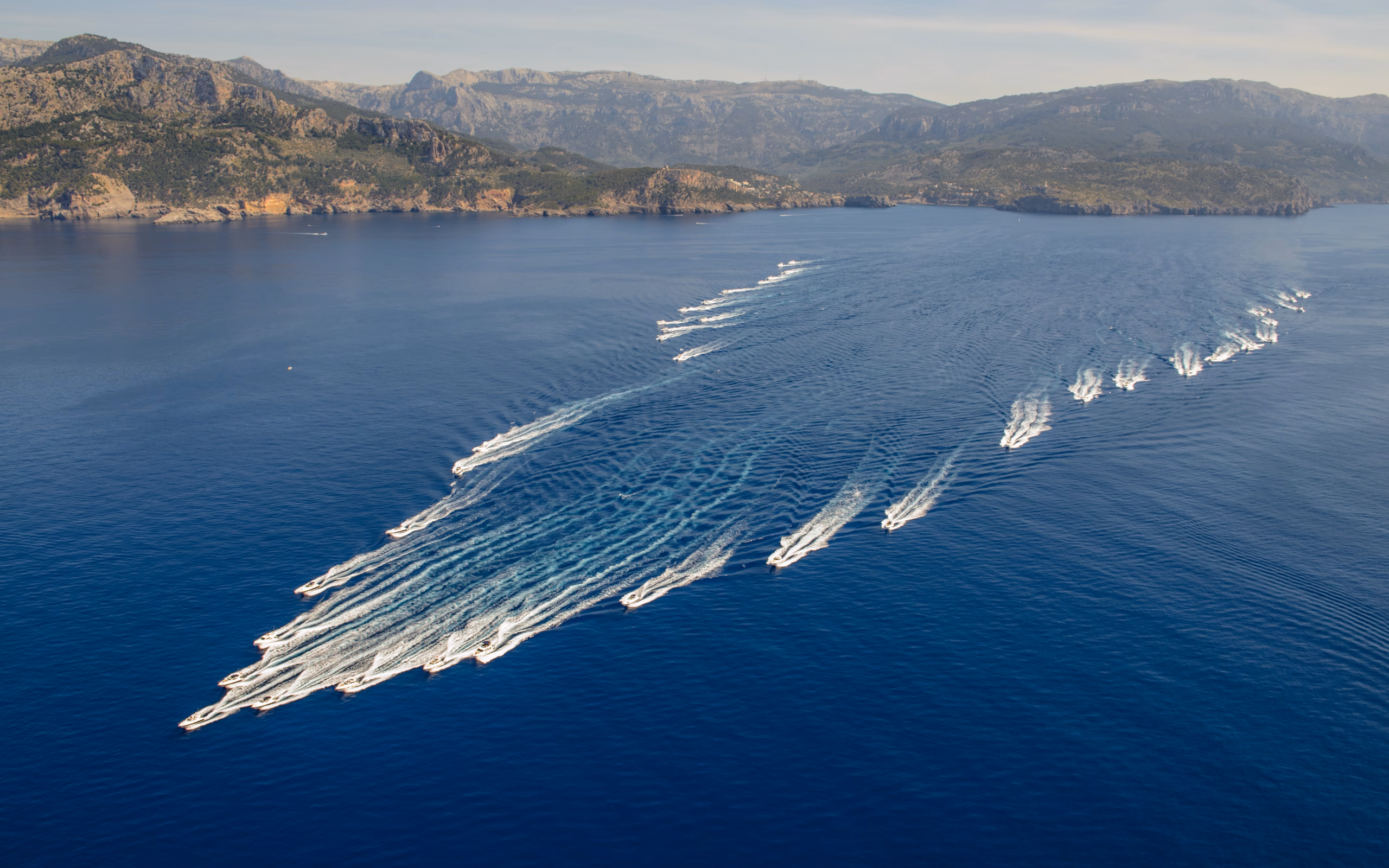 Boats sailing in formation