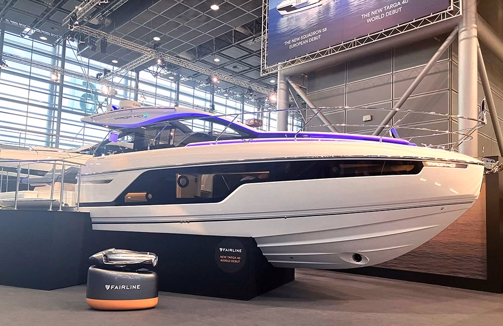 Luxury yacht with purple lights.
